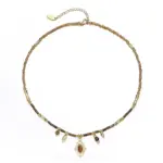 Maillard-Style Tiger Eye Necklace – 18K Gold-Plated 1 LIVKE’s oval tiger eye necklace with 18K gold-plated chain, styled with black sweater for minimalist elegance.