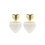 Vintage Heart Stud Earrings 1 LIVKE’s vintage heart stud earrings with textured gold finish, styled with a denim jacket for casual-chic outfits.