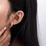 Vintage Pearl Hoop Earrings 3 LIVKE’s gold vintage pearl hoop earrings styled with a lace dress for timeless retro elegance.