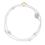 18K Gold Baroque Pearl Necklace 1 LIVKE’s gold baroque pearl necklace styled in three ways: as a choker, layered chains, and wrapped bracelet for boho versatility.