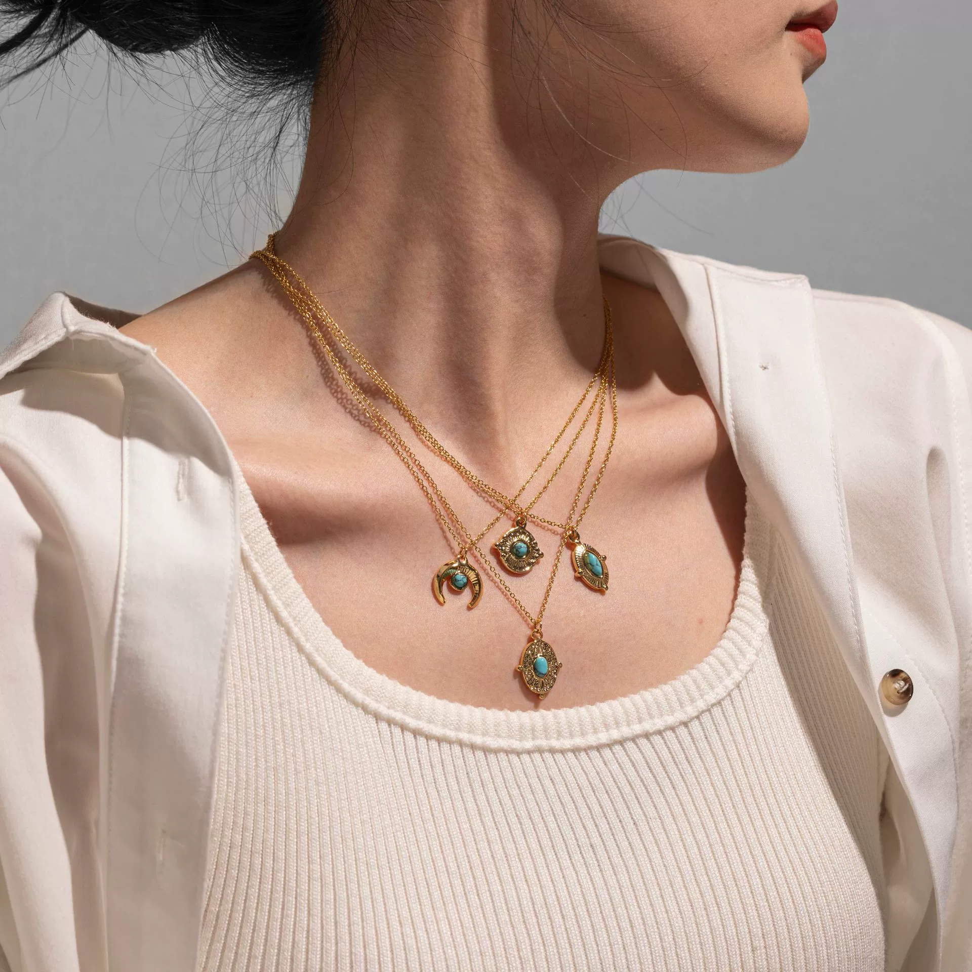 livke-18k-gold-oval-bead-vintage-necklace.jpg LIVKE’s gold oval bead necklace with intricate vintage texture, styled with a black evening gown for royal-inspired elegance.