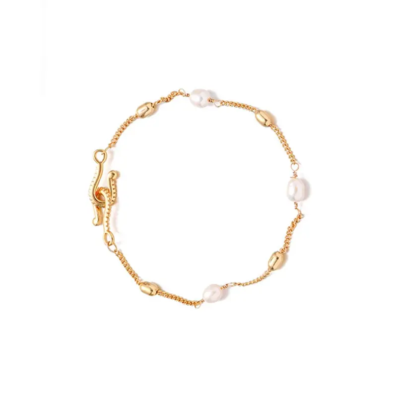 livke-18k-gold-pearl-adjustable-bracelet (4) LIVKE’s gold freshwater pearl bracelet styled three ways: wrist, layered, and ankle chain for versatile elegance.