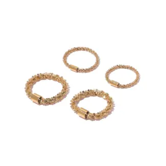 LIVKE’s 18K PVD gold minimalist ring stacked with raw-edge bands for modern gender-neutral style.