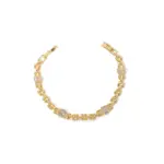 18K Gold-Plated Cubic Zirconia Watch Band Bracelet 1 LIVKE’s gold watch band bracelet with geometric zirconia links, styled with a leather folio for modern power dressing.