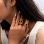 French-Inspired Black Heart Ring 4 LIVKE’s French-inspired black heart adjustable ring on a hand with black nail polish, styled for edgy everyday elegance.