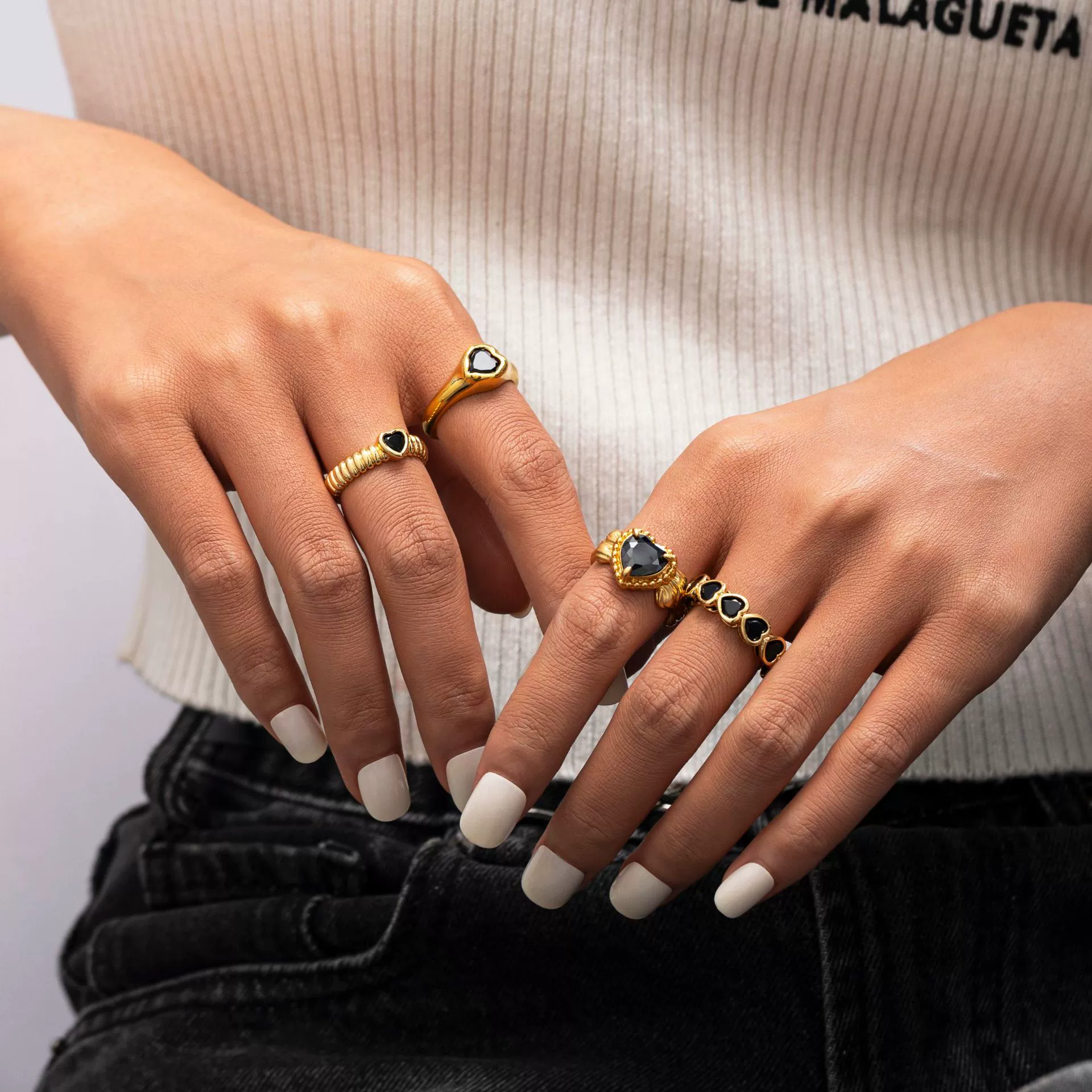 LIVKE’s French-inspired black heart adjustable ring on a hand with black nail polish, styled for edgy everyday elegance.