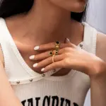 French-Inspired Black Heart Ring 5 LIVKE’s French-inspired black heart adjustable ring on a hand with black nail polish, styled for edgy everyday elegance.