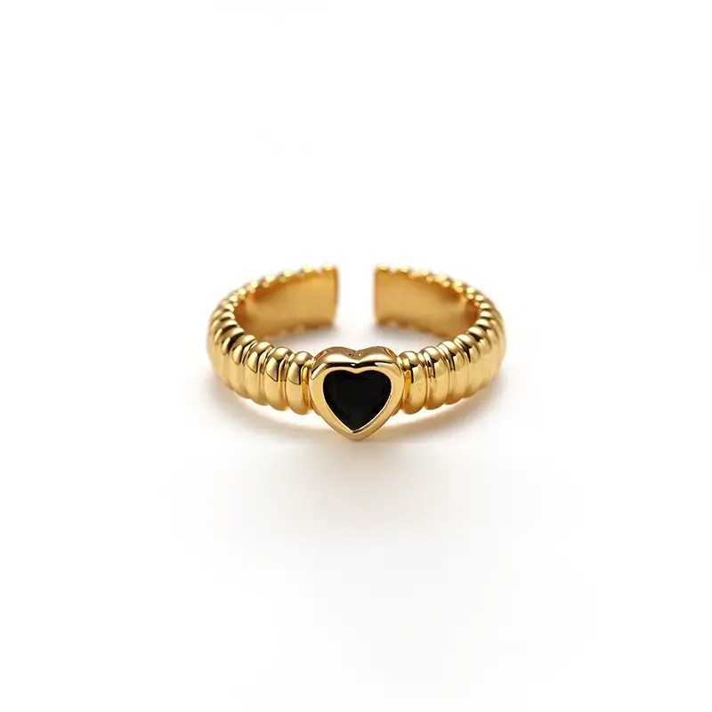 LIVKE’s French-inspired black heart adjustable ring on a hand with black nail polish, styled for edgy everyday elegance.