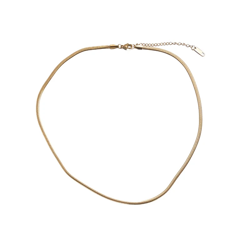 livke-boho-shell-turquoise-necklace (5) LIVKE’s gold snake chain necklace with shell and turquoise pendant, layered with beaded bracelets for boho summer style.