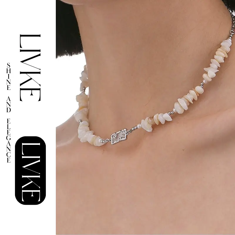 LIVKE’s single-strand boho beach necklace with shells and gold accents, styled with a white tank top for minimalist coastal style.