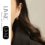 Geometric Square Hoop Earrings 2 LIVKE’s gold geometric square hoop earrings styled with a black turtleneck for minimalist urban elegance.