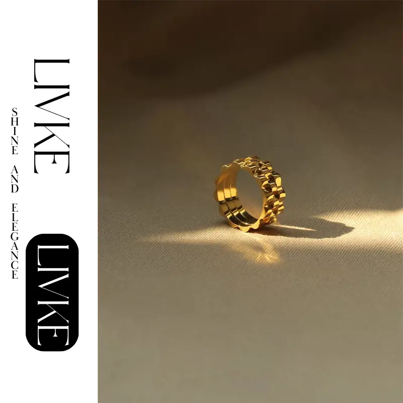 livke-industrial-gear-gold-ring (2) LIVKE’s gold gear ring on a hand with black polish, styled with a leather jacket for urban minimalist edge.