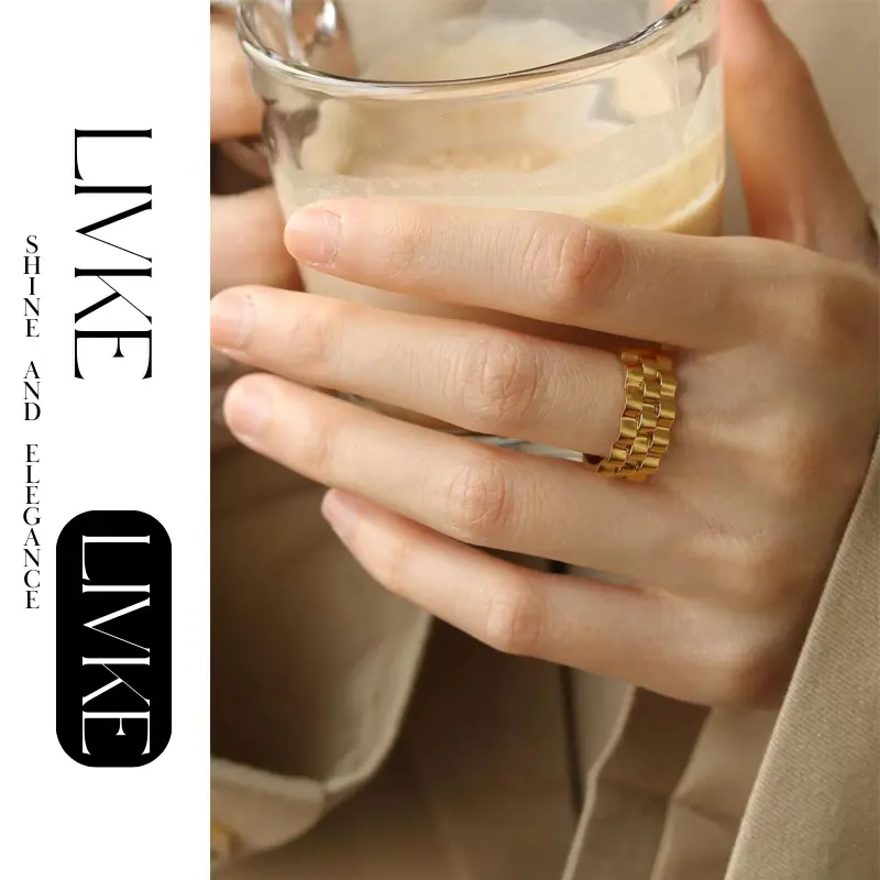 livke-industrial-gear-gold-ring LIVKE’s gold gear ring on a hand with black polish, styled with a leather jacket for urban minimalist edge.