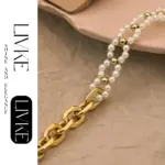 18K Gold-Plated Pearl Chain Bracelet 4 LIVKE’s gold pearl chain bracelet styled on a wrist with a linen sleeve for boho everyday elegance.