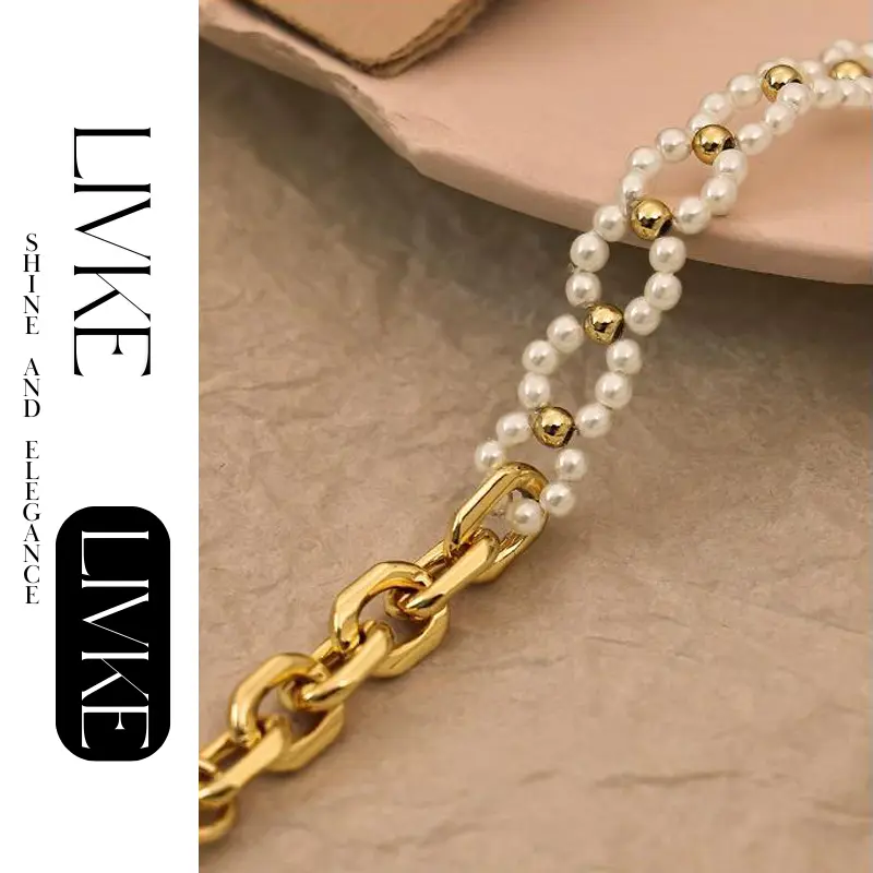 LIVKE’s gold pearl chain bracelet styled on a wrist with a linen sleeve for boho everyday elegance.