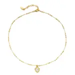 Vintage Heart Necklace 1 LIVKE’s gold vintage heart necklace with cubic zirconia, layered with a thin chain for minimalist office elegance.