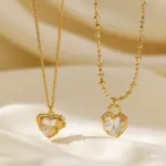 Vintage Heart Necklace 5 LIVKE’s gold vintage heart necklace with cubic zirconia, layered with a thin chain for minimalist office elegance.