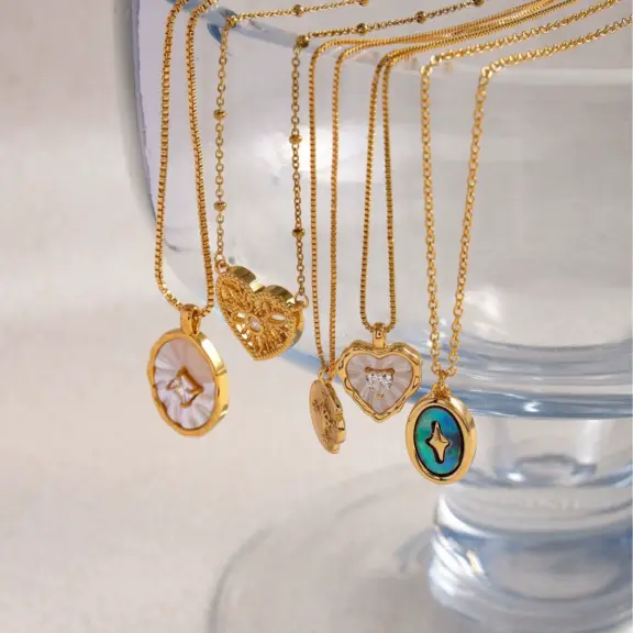 How to Clean Silver Jewelry: 7 Pro Tips to Restore Shine & Prevent Tarnish | LIVKE 2 LIVKE’s vintage malachite pendant necklace on a black velvet choker, styled for Art Deco-inspired evening elegance.