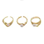 Vintage Gold Leaf Pearl Ring 1 LIVKE’s gold leaf and pearl adjustable ring on a hand with neutral nails, styled with a linen dress for effortless boho elegance.