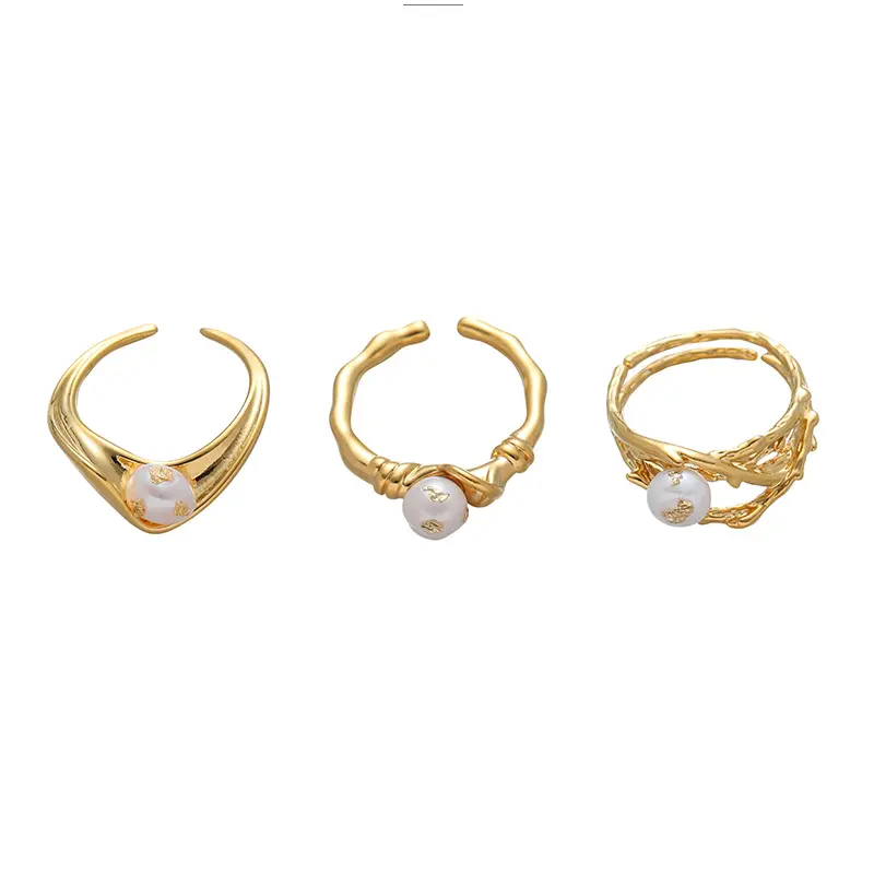 livke-vintage-pearl-gold-leaf-ring LIVKE’s gold leaf and pearl adjustable ring on a hand with neutral nails, styled with a linen dress for effortless boho elegance.