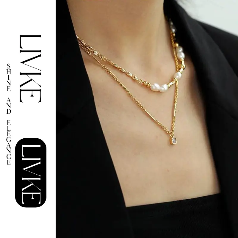 livke-vintage-square-zircon-necklace (3) LIVKE’s gold-plated square zircon pendant necklace styled with a white silk blouse for timeless elegance.