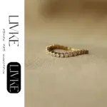 LIVKE’s gold vintage chain ring with zirconia details, stacked with minimalist bands for office-ready elegance.