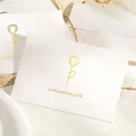 Close-up of a microfiber jewelry polishing cloth showing textured and smooth sides