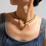 18K Gold-Plated Brass Natural Stone Necklace 7 Adjustable LIVKE brass necklace with amethyst and turquoise beads layered over linen dress for bohemian everyday style.