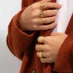Artisan Zirconium Ring Set 2 Woman stacking LIVKE textured gold rings with UV color shift effect for TikTok transition video