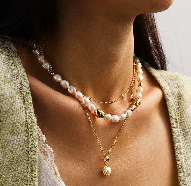Young woman wearing LIVKE bohemian pearl choker necklace with floral dress in sunflower field, showcasing cottagecore aesthetic jewelry