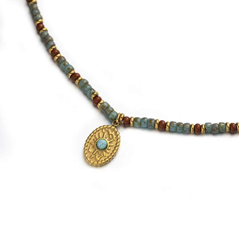 livke-minimalist-zirconia-sweater-necklace-layering (4) Woman wearing LIVKE cubic zirconia sweater necklace with knitwear and blazer, showcasing versatile minimalist jewelry for work and casual outfits