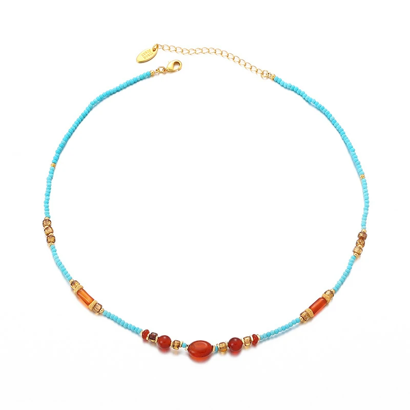 Asian model wearing LIVKE beaded necklace with cheongsam and tailored blazer, blending traditional Chinese elements with modern minimalist style