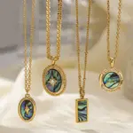 Oceanic Vintage Necklace Set 5 Layered oceanic necklaces on sand with seashells under sunset light