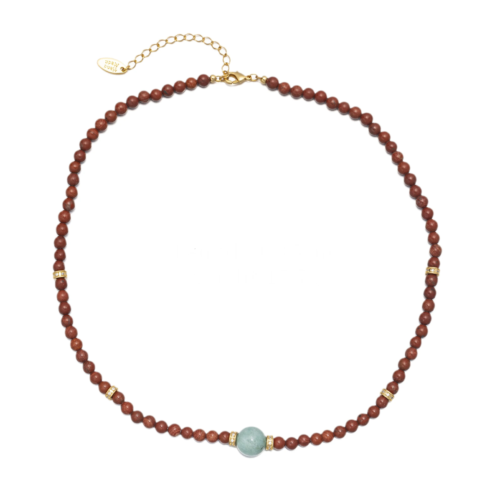 LIVKE’s 18K gold-plated red agate necklace layered with delicate chains on a linen backdrop, styled for boho-chic elegance