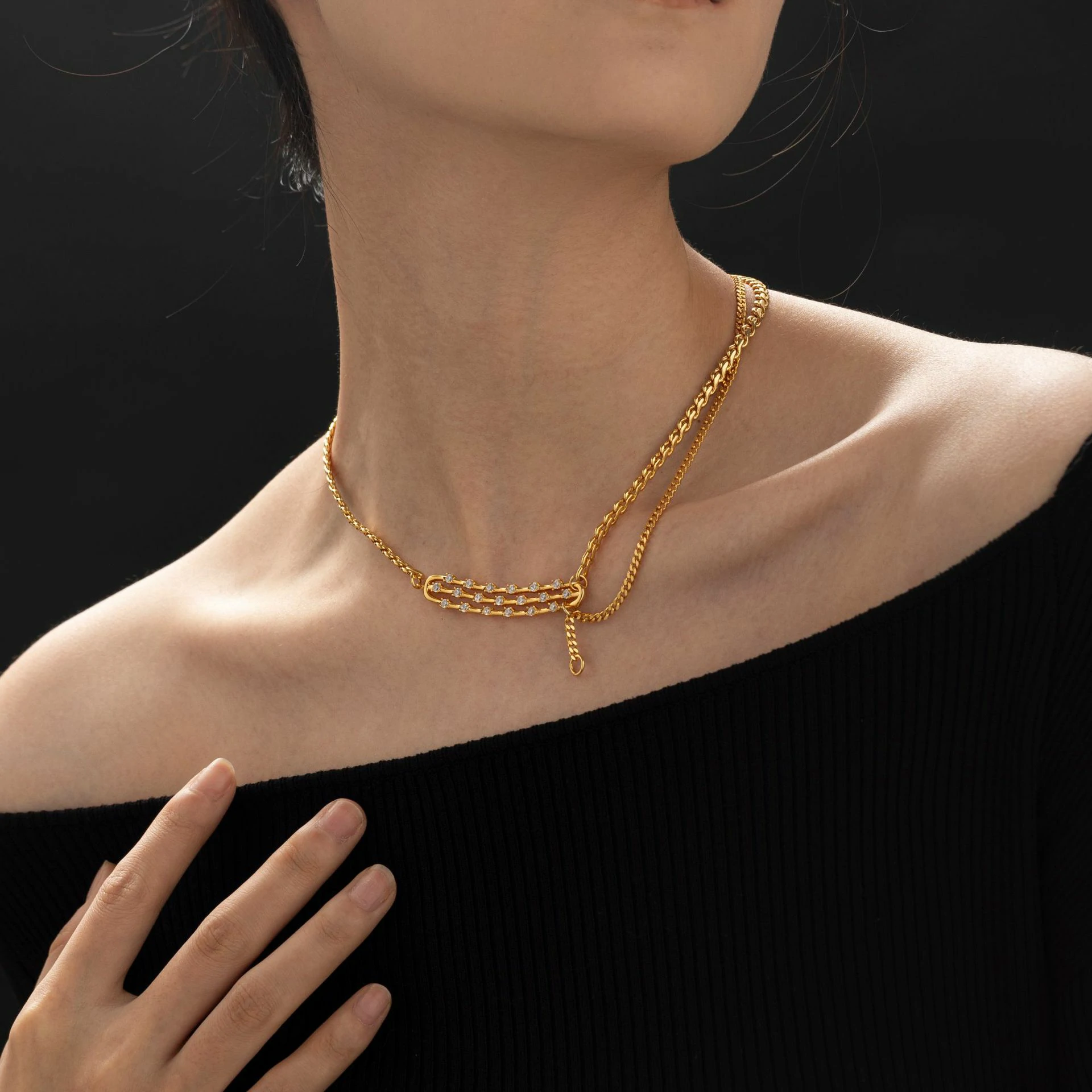 LIVKE gold-plated adjustable chain necklace with cubic zirconia stones, layered with minimal pendants for everyday jewelry styling