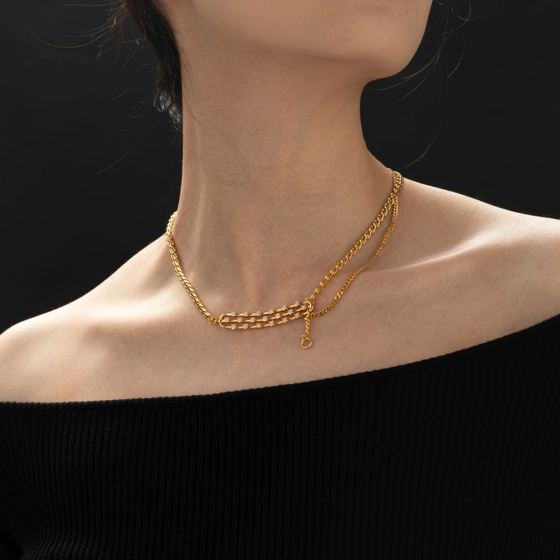 LIVKE gold-plated adjustable chain necklace with cubic zirconia stones, layered with minimal pendants for everyday jewelry styling