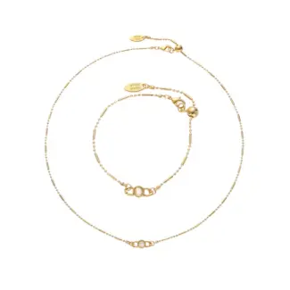 Delicate gold and silver chain set with iridescent shell pendants, perfect for beach weddings and minimalist jewelry lovers