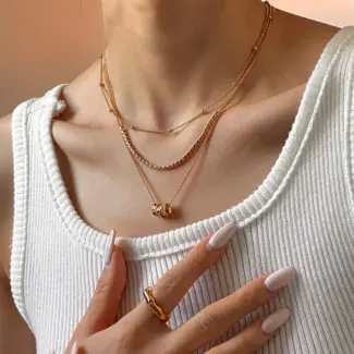 Red and green cubic zirconia tri-ring jewelry set with detachable ear cuffs, perfect for cyberpunk fashion and festival rave accessories